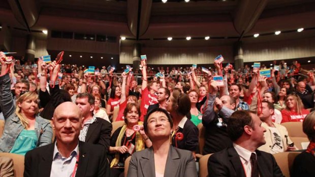 Senator Penny Wong watches on as delegates vote on making marriage equality Labor policy.