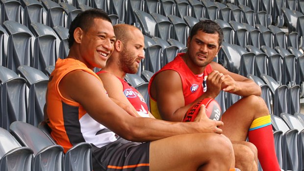 Triple treat ... Israel Folau, Jarrad McVeigh and Karmichael Hunt at Rooty Hill Stadium earlier this year.