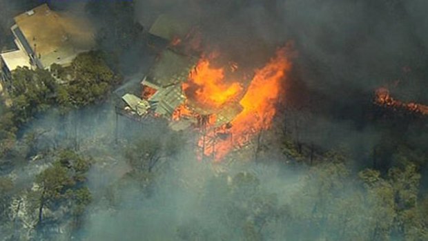 Homes were destroyed by bushfire in Roleystone.