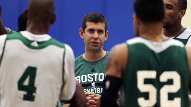 New leader: Boston Celtics head coach Brad Stevens talks with his players during their NBA basketball training camp.