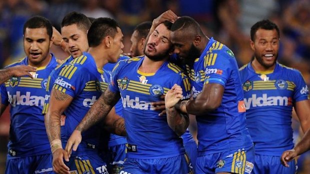 Parramatta players celebrate a try during last weekend's win over the Broncos.