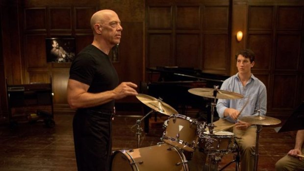 Andrew Neiman (played by Miles Teller) comes up against a cruel and unusual teacher, Terence Fletcher (J.K. Simmons) in <i>Whiplash</i>.