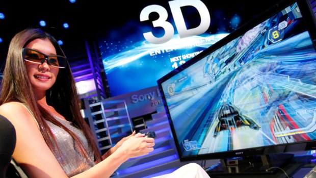 Japan's big-name electronic manufacturers are readying flat-screen TVs that can show high-definition movies and video games in 3D.