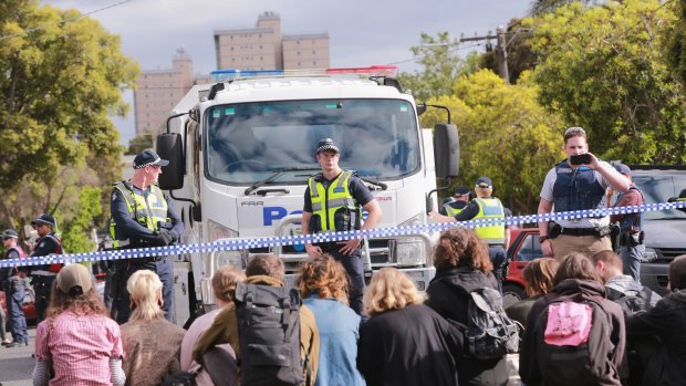 Squatters from East West Link housing in Bendigo Street, Collingwood defy police last month. 