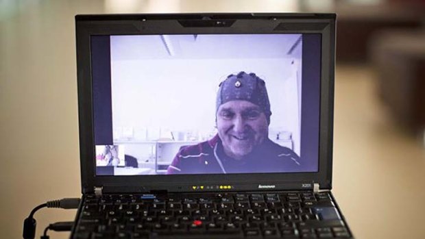 Mark-Andre Duc, a partially tetraplegic patient, is seen on a laptop as he talks to scientists in Switzerland's Federal Institute of Technology in Lausanne, from a hospital 100 kilometers away.