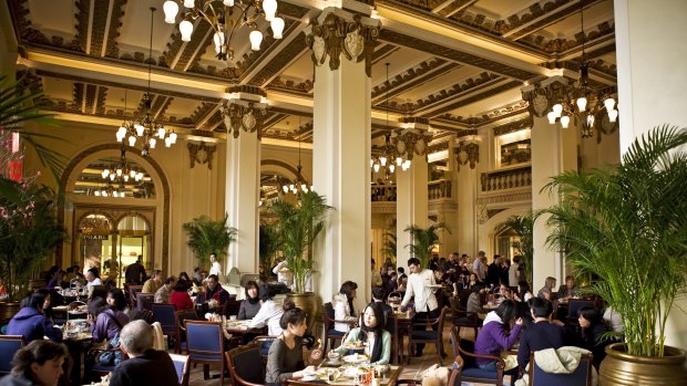The queue for high tea at the Peninsula Hotel in Hong Kong starts an hour beforehand.