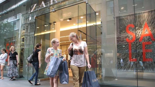 New breed ... Ailsa Harris, 11, and her mother, Lorena, shopping yesterday. Fashion labels are adhering to new demand for clothing from the tween age group.
