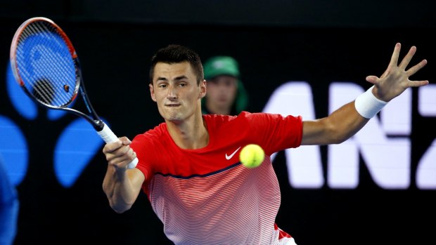 Winning ways: Bernard Tomic hits a forehand return during his second round match against Italy's Simone Bolelli.