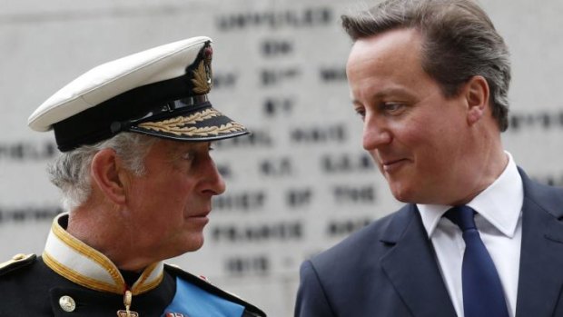 British Prime Minister David Cameron (right) with Prince Charles. Mr Cameron has pledged to give Scotland more tax-raising powers if Scots vote 'No' to independence.