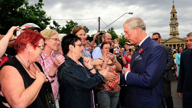 Prince Charles is greeted by crowds in South Melbourne this morning.