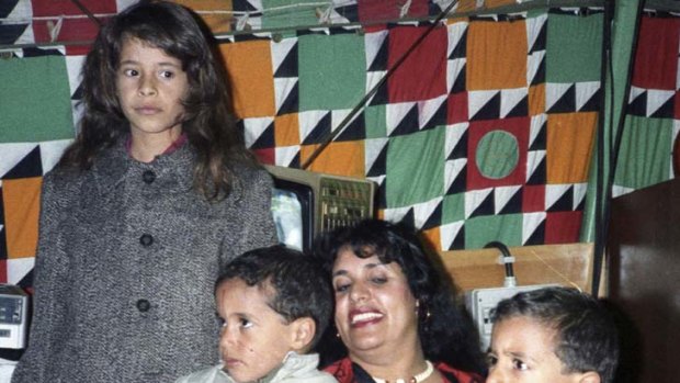 Safia Gaddafi, wife of Libyan leader Muammar Gaddafi, with her children in 1986.