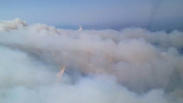 Smoke fills the air over North Stradbroke Island.