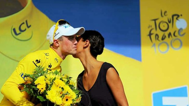 Simon Gerrans of Australia and Orica GreenEDGE is congratulated on the podium after retaining the yellow jersey following stage five of the 2013 Tour de France.