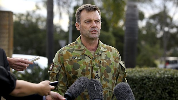 Brigadier Greg Bilton speaks to the media at Enoggera Barracks today.