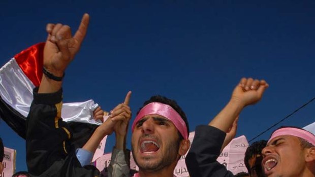 Pink revolution ... Yemeni protesters say they have adopted the colour pink to show they do not want violence.