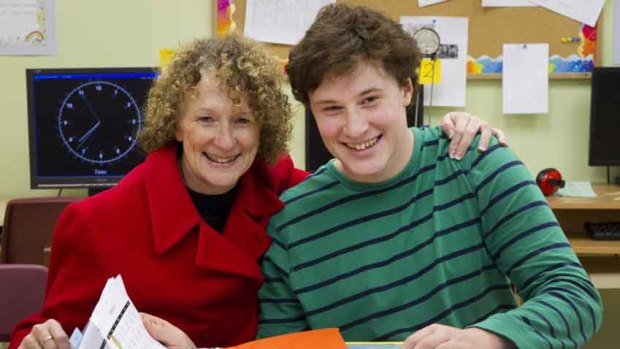 Debra Gilmore with son Robert at an Arrowsmith school in Canada.