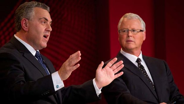 "We didn't say we wouldn't raise any taxes": Joe Hockey addresses a live forum at Penrith Panthers Leagues Club for the ABC's <em>Q&A</em> with host Tony Jones, right.
