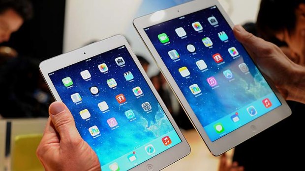 Apple's iPads held onto the top spot for tablet sales. Pictured are the iPad mini, left, and Air.
