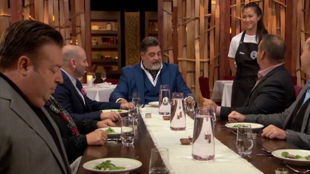 Diana Chan serves Peter Gilmore (far left) among others at the MasterChef table.