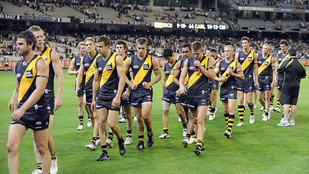 Disconsolate Richmond players walk off after losing to Carlton in the first round last year.