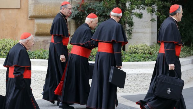 Cardinals arrive for a meeting at the Synod Hall in the Vatican on March 5, 2013.