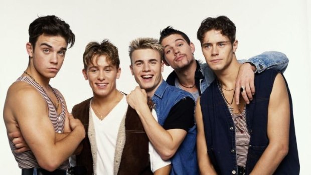 Boys to men: Williams with Take That in 1992; (from left) Williams, Mark Owen, Gary Barlow, Jason Orange and Howard Donald.
