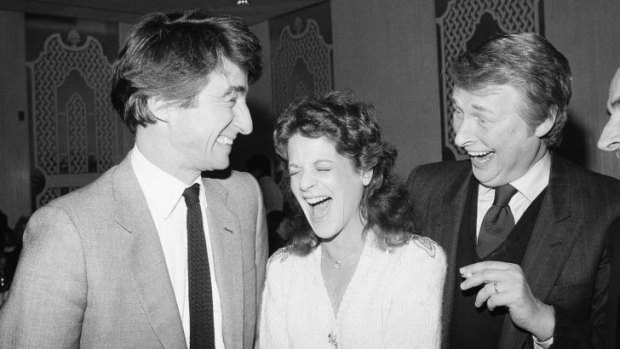 Gilda Radner, centre, and Sam Waterston, left, stars of the Broadway comedy <i>Lunch Hour</i>, share a laugh with Mike Nichols after opening night.