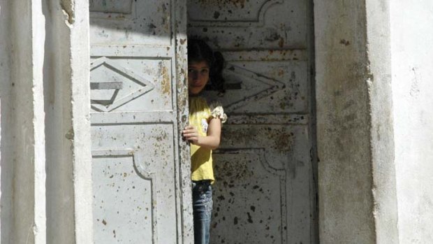 A fearful girl in Hama.