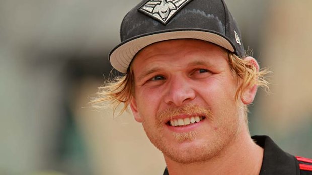 Reason to smile: Bomber Michael Hurley says he is enjoying life as a defender after spending most of his career as a forward.