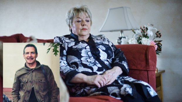 Margaret Daly and a photograph of her husband, John, who died two years after he went into aged care.