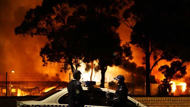 Rage burns...  buildings at Villawood Detention Centre burned into the early hours.