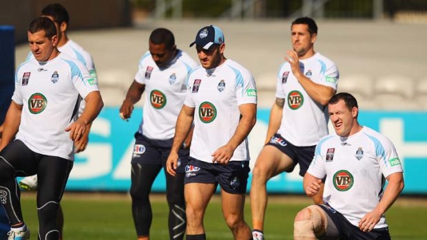 Made for Origin ... Blues players Greg Bird, far left, and captain Paul Gallen, far right, at training on Friday, will be doing their best tonight to ensure the series goes to a decider.