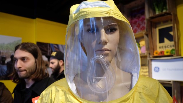 Jhpiego, a global health non-profit and affiliate of Johns Hopkins University, showcases an advanced protective suit for healthcare workers who treat Ebola patients during an event at New York Fashion Week. 