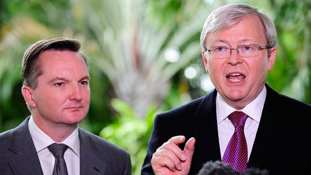 Prime Minister Kevin Rudd and Treasurer Chris Bowen speak at a media conference that outlines federal budget cuts on July 16, 2013 in Townsville, Australia.