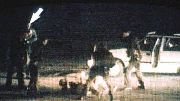 A still from a video showing the March 3, 1991 incident in Los Angeles in which Rodney King (on ground) was beaten by police officers.