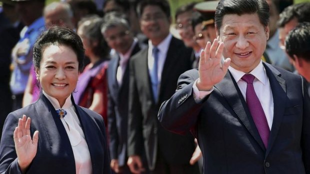 Chinese President Xi Jinping, right, with his wife Peng Liyuan in New Delhi, India