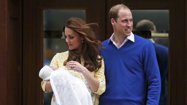 Prince William and  Catherine, Duchess of Cambridge, emerge from a London hospital with newborn Princess Charlotte.