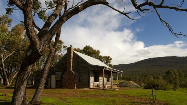 Log in: Redgum Log Cottage is one of four at Grampians Pioneer Cottages.