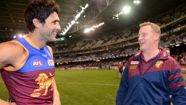 Both gone? Brent Staker with coach Michael Voss after Brisbane's win over Essendon at Etihad Stadium.