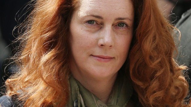Straight-laced ... Rebekah Brooks tames her mane for court.