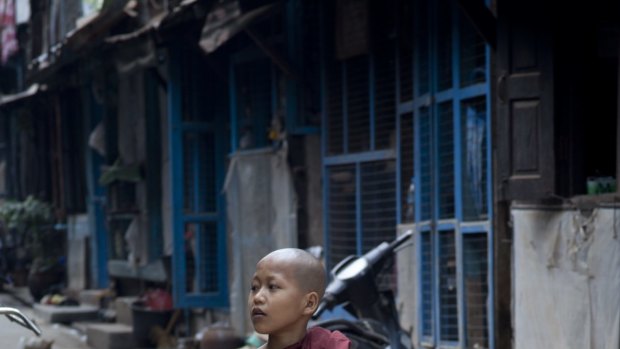 A young monk in Mawlamyine.