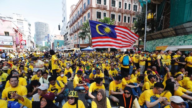 Protesters occupy a street in downtown Kuala Lumpur to demand electoral reform and Najib Razak's resignation.