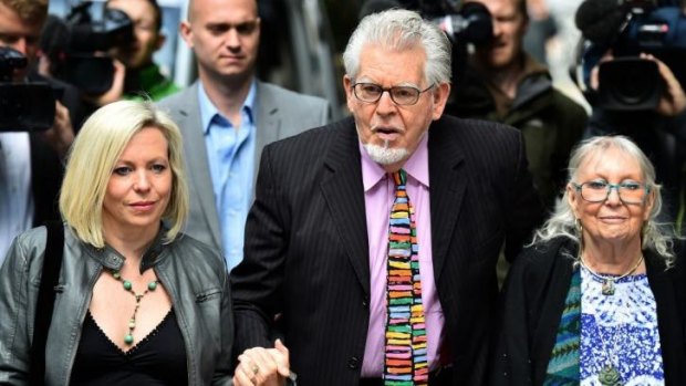 Rolf Harris arrives with his wife Alwen Hughes and daughter Bindi at Southwark Crown Court.