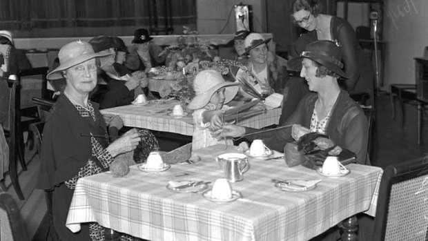 Going to town: "DJs wasn't just shopping, it was was an occasion ... There was a sense of theatre about it, of putting on your hat and gloves and creating a whole day." Matrons of 1935 enjoy a knitting tea.