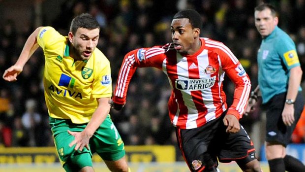 Norwich City's Ryan Bennett (left) vies with Sunderland's Danny Rose.