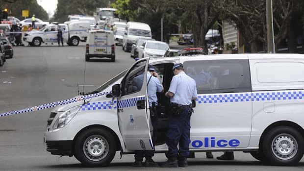 Investigation: Police in Redfern after a man was shot in the foot during a struggle.