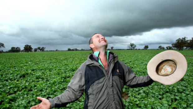 Silver lining ... Howlong farmer Nick Ennis welcomes the rain.