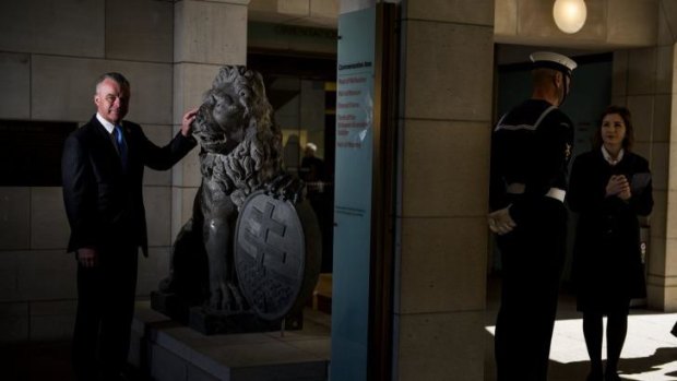 Back to Belgium: War Memorial director Brendan Nelson with the lion sculptures from Menin Gate.