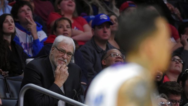 Keeping an eye on proceedings: New York Knicks president Phil Jackson watches as his team takes on the Los Angeles Clippers in Los Angeles. 