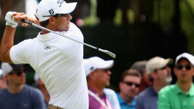 On the charge: World No.1 Adam Scott has fired a bogey-free 66.